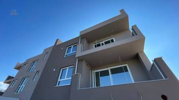 Thumbnail von Neubauwohnung auf zwei Ebenen mit Dachterrasse, Meerblick und Garage