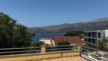 Thumbnail von Erdgeschosswohnung mit Terrasse und Meerblick nahe dem Strand