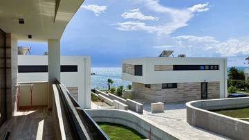 Thumbnail von Moderne Villa mit Swimmingpool in der zweiten Reihe zum Meer