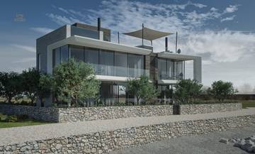 Neubauvilla mit Dachpool und Aufzug in erster Reihe am Meer