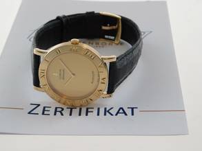 Thumbnail von Corum Romvlvs 18 Karat Gelbgold Romulus Automatik Herrenuhr 35 mm im Best Zustand mit Box und Zubehör </h1>