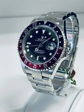  Rolex GMT-Master II COKE / CALIMOCHO - 2005 - JUST PERFECT - Box & Papers 