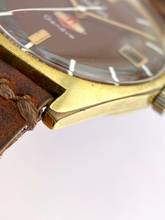 Thumbnail von Omega Genève Vintage 136.041 rare burgundy Inland Dial 136041
