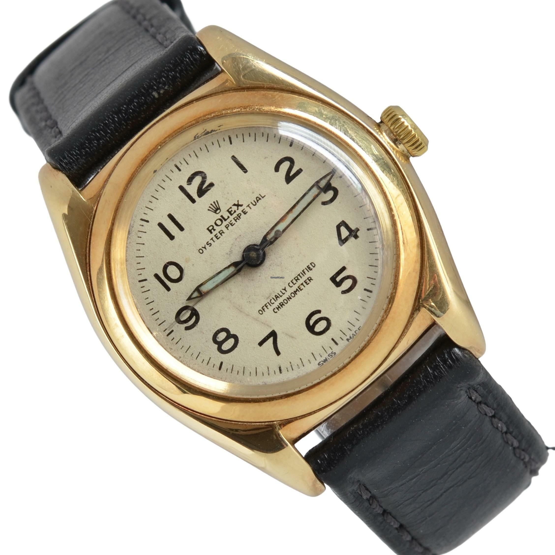 Rolex Oyster Perpetual 3131 BubbleBack Ivory radium dial yellow gold 14KT 1948's </h1>