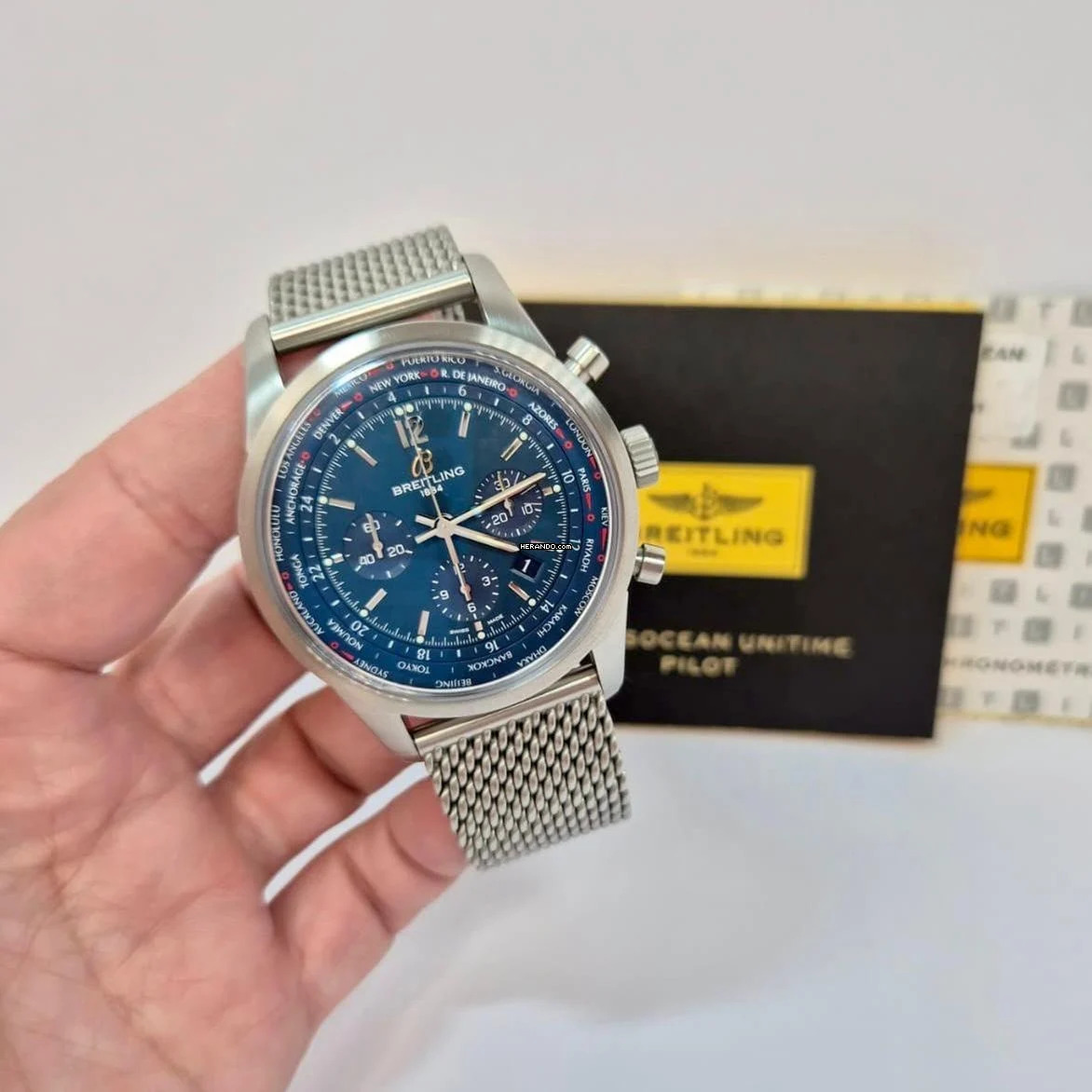 Breitling Transocean Chronograph Unitime World Time 46mm Mesh Completo