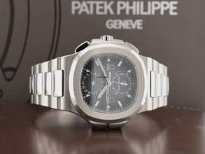 Thumbnail von Patek Philippe Nautilus Travel Time Chronograph 5990/1a Blue Dial New </h1>