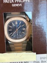 Thumbnail von Patek Philippe Nautilus Blue Ref Nr 5980/1AR-001-Single Sealed-Deutsch-Anonym-08/2021 Sofort
