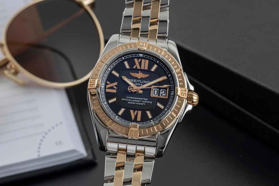  Breitling Cockpit Stahl / Gold Automatik Herrenuhr Ref. C4935012 inkl. Papiere  