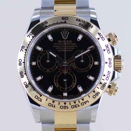  Rolex Daytona Stahl Gold black Dial Cosmograph Full-Set ungetragen  