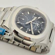 Thumbnail von Patek Philippe Nautilus Travel Time Flyback Blue Dial 40.5mm Automático Completo