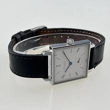 Thumbnail von NOMOS Tetra Glashütte Tetra Ref. 406 mit Stahlgehäuse Lederband plus Original Nomos Lederband (neu) Handaufzug Zifferblatt creme-weiß Original Box