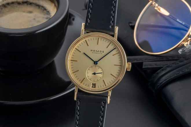  NOMOS Tangente 18k (0,750) Gold Intex Datum Handaufzug Herrenuhr Gold Dial 