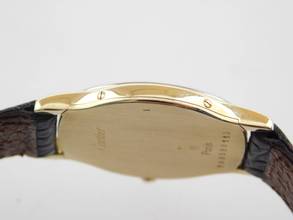 Thumbnail von Cartier Arcade Paris Handaufzug 18 Karat Gelbgold mit Original Band und Schließe mit seltener 18 Karat Weißgoldlünette 24 x 31 mm Rarität