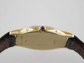 Thumbnail von Cartier Arcade Paris Handaufzug 18 Karat Gelbgold mit Original Band und Schließe mit seltener 18 Karat Weißgoldlünette 24 x 31 mm Rarität
