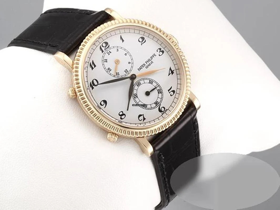  Patek Philippe Travel Time 5034j 2008 Gelbgold 750 Handaufzug Gold 