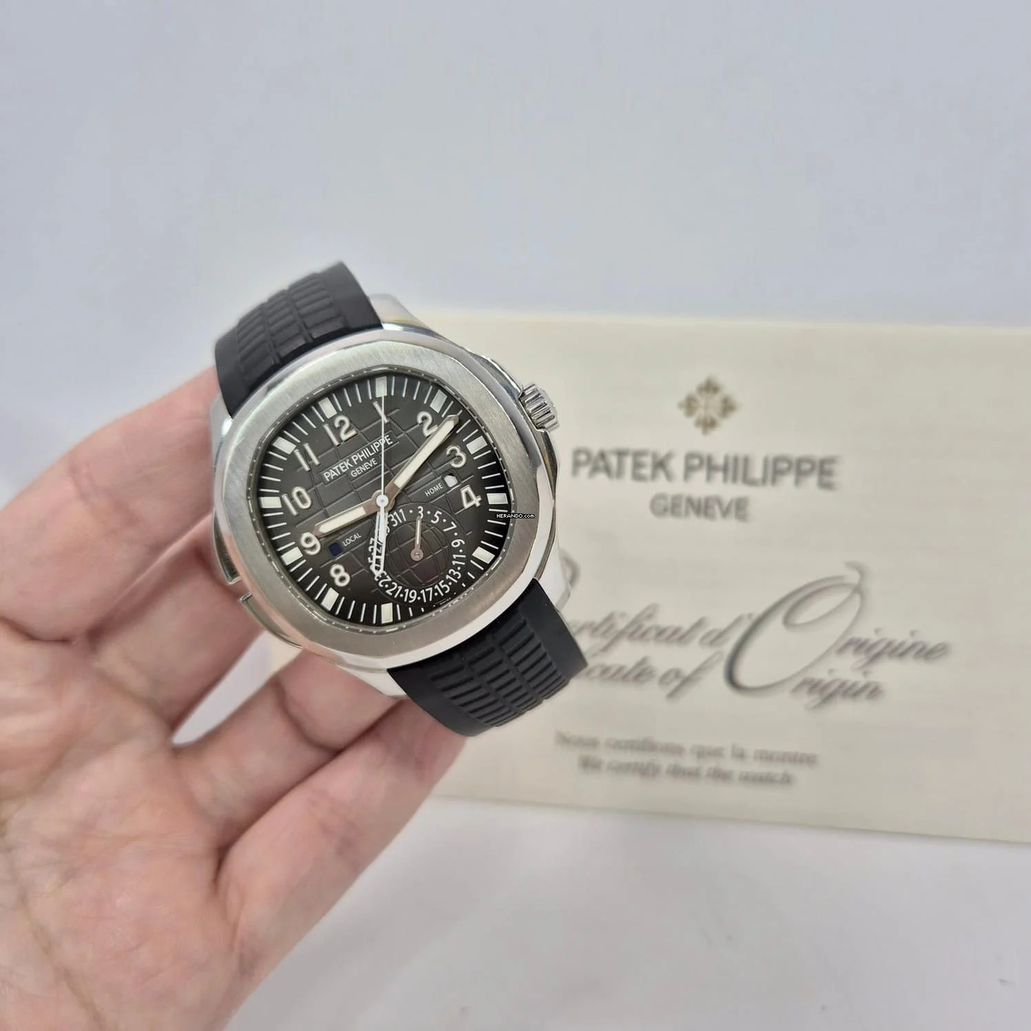 Patek Philippe Aquanaut Travel Time 40.8mm Automático Completo 