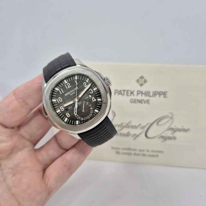  Patek Philippe Aquanaut Travel Time 40.8mm Automático Completo 