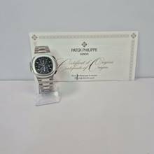 Thumbnail von Patek Philippe Nautilus Travel Time Flyback Chronograph Blue Dial 40.5mm Completo