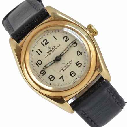  Rolex Oyster Perpetual 3131 BubbleBack Ivory radium dial yellow gold 14KT 1948's 