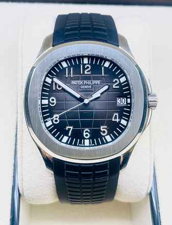  Patek Philippe Aquanaut (with first buying receipt) NEW,UNWORN + BOX&PAPERS + NEW Clasp and Movement 