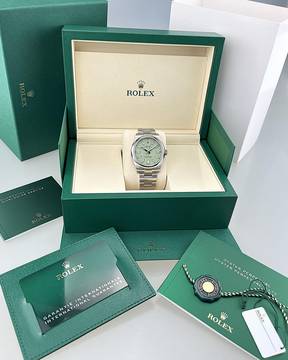  Rolex Oyster Perpetual 41 Pistachio 02/2026 Ref. 134300 neu/ungetragen Full Set deutsche Auslieferung (LC100) Rolex Price-Hangtag 