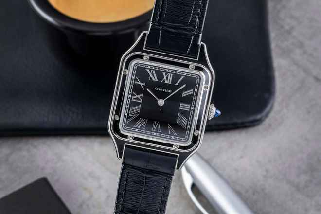  Cartier Santos Dumont Black Lacquer Handaufzug Herrenuhr Ref. WSSA0046 B&P 2024 