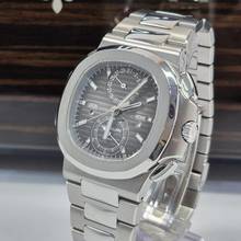 Thumbnail von Patek Philippe Nautilus Travel Time Flyback Chronograph 40,5 мм Полностью