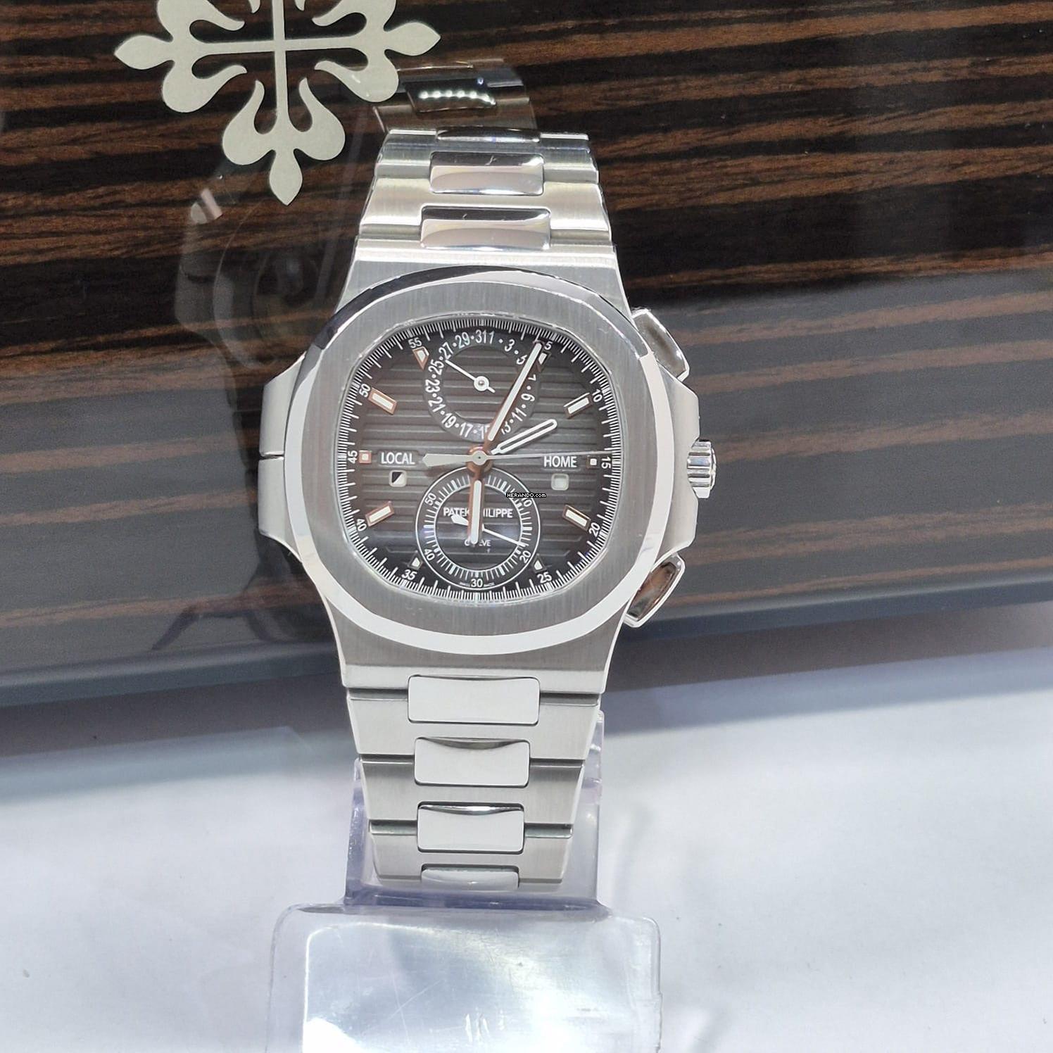 Thumbnail von Patek Philippe Nautilus Travel Time Flyback Chronograph 40,5 mm Komplett