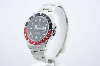 Thumbnail von Rolex GMT-Master II Coke - SWISS - UNWORN - 16710 1999