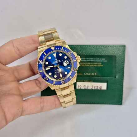 Rolex Submariner Date Gelbgold 41mm Automatik Vollständig