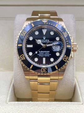  Rolex Submariner Date Black Dial like NEW Yellowgold 18Kt. with Original Papers 