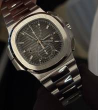 Thumbnail von Patek Philippe Nautilus Steel Traveltime Chronograph 5990/1A - New - Fullset 2016
