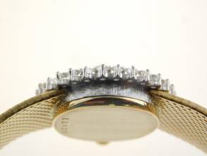 Thumbnail von Audemars Piguet 18 Karat Gelbgold mit original Diamantbesatz und grünem Blatt Rarität Lady Cocktailwatch im original Zustand Handaufzug