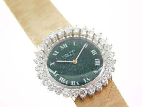 Audemars Piguet 18 Karat Gelbgold mit original Diamantbesatz und grünem Blatt Rarität Lady Cocktailwatch im original Zustand Handaufzug