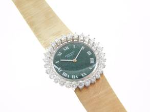 Thumbnail von Audemars Piguet 18 Karat Gelbgold mit original Diamantbesatz und grünem Blatt Rarität Lady Cocktailwatch im original Zustand Handaufzug