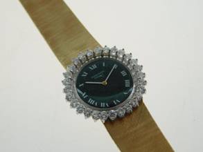 Thumbnail von Audemars Piguet 18 Karat Gelbgold mit original Diamantbesatz und grünem Blatt Rarität Lady Cocktailwatch im original Zustand Handaufzug