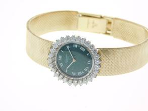 Thumbnail von Audemars Piguet 18 Karat Gelbgold mit original Diamantbesatz und grünem Blatt Rarität Lady Cocktailwatch im original Zustand Handaufzug