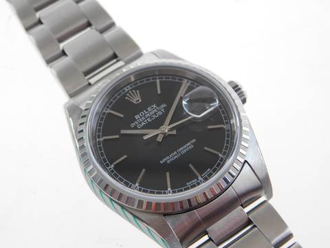 Rolex Datejust 36 Stahl 36 mm Saphirglas mit schwarzem Zifferblatt Volle Rolex Garantie Rolex Revision Garantie bis 2028 verklebt !