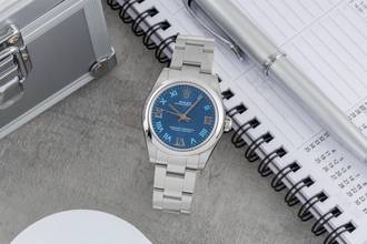 Thumbnail von Rolex Oyster Perpetual 31 Blue Roman Dial Stahl Automatik Damenuhr R. 177200 B&P