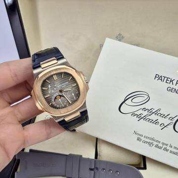 Patek Philippe Nautilus 5712 Moonphase Power Reserve Ouro Branco & Ouro Rosé 40mm Automático Completo