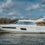 Prestige-550-flybridge-motor-yacht-for-sale-exterior-image-Lengers-Yachts-6-scaled.jpg