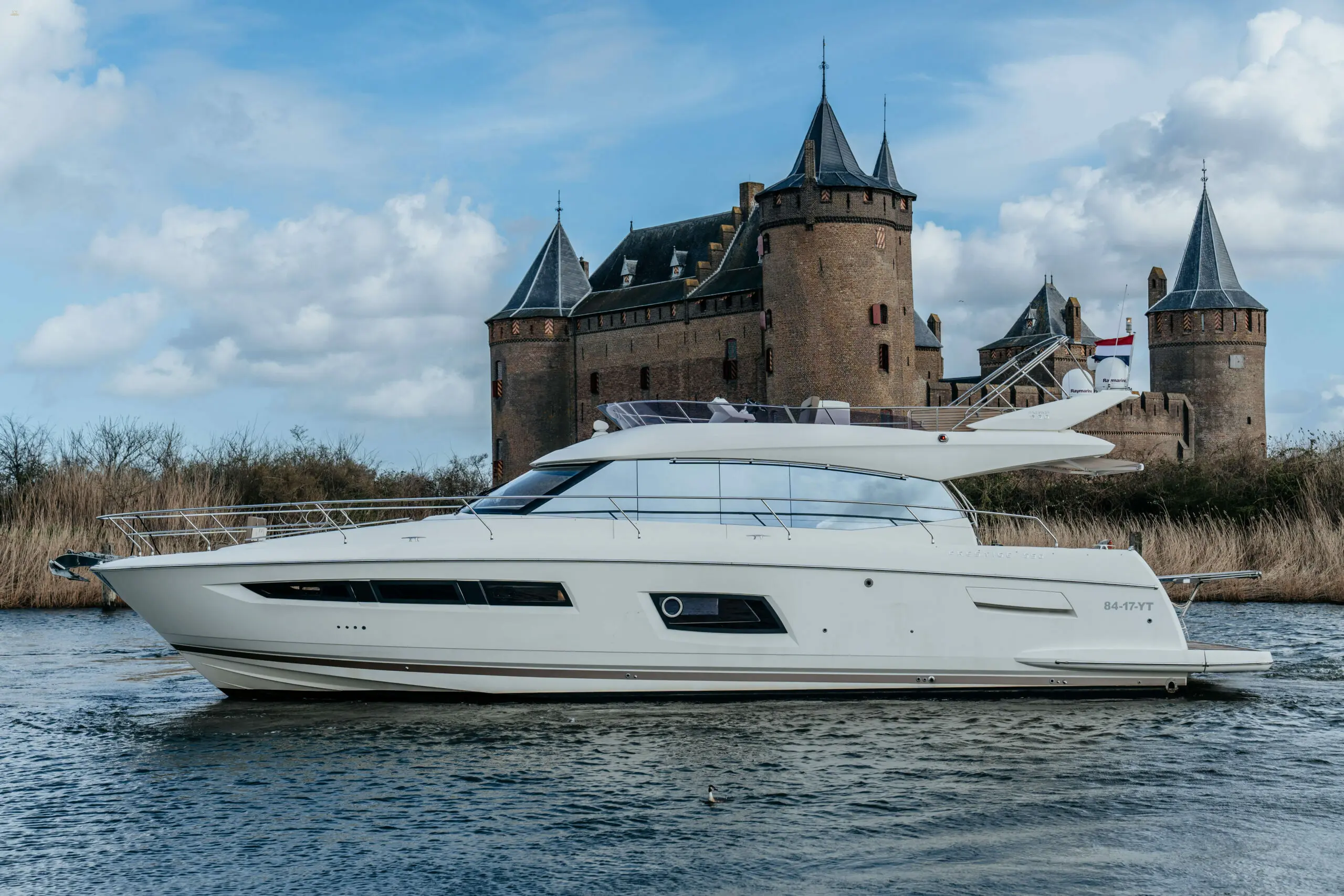 Prestige-550-flybridge-motor-yacht-for-sale-exterior-image-Lengers-Yachts-7-scaled.jpg