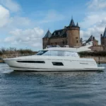Prestige-550-flybridge-motor-yacht-for-sale-exterior-image-Lengers-Yachts-8-scaled.jpg